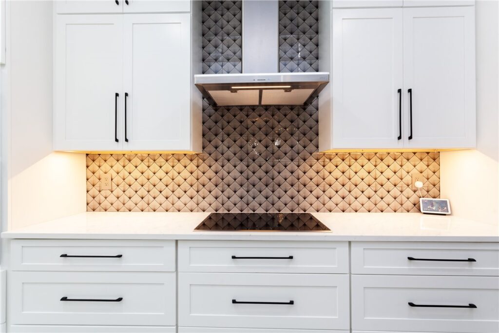 Modern kitchen featuring custom wood cabinets with soft-close drawers