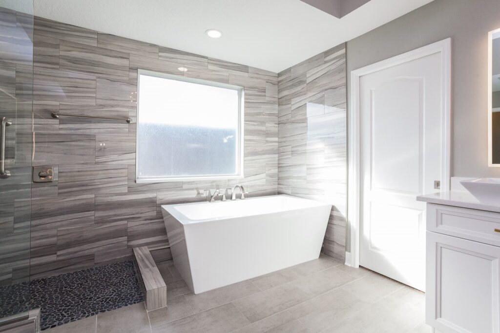Modern soaking tub installed in a fully remodeled Tampa bathroom