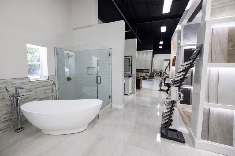 Bathtub and shower in a showroom featured with beautiful natural lighting.