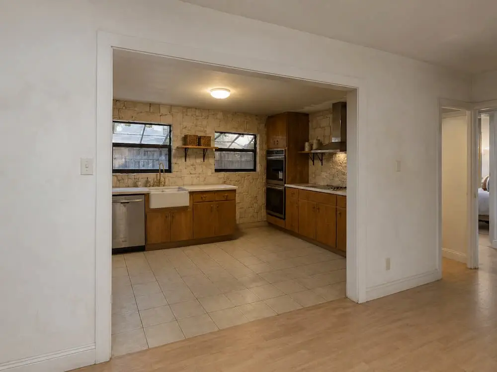 Builder-grade Tampa Palms kitchen with closed layout before CMK Construction open-concept conversion