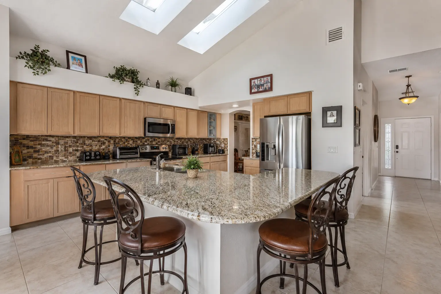 Dated Carrollwood Tampa kitchen with oak cabinets and laminate counters before CMK Construction remodel