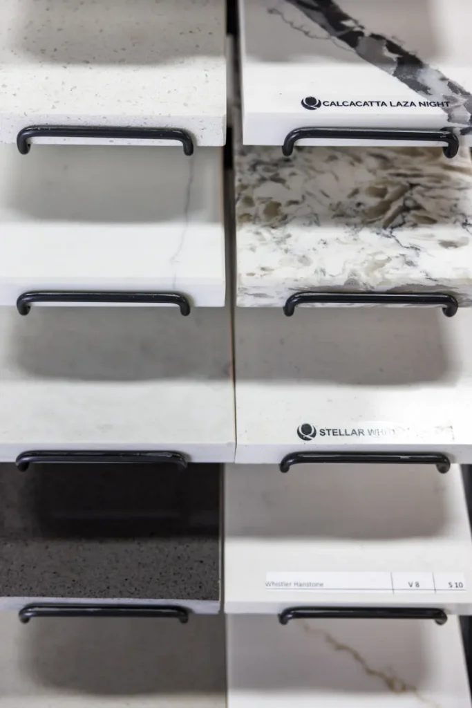 countertop sample drawers inside the cmk design studio in tampa showing quartz granite and quartzite options for kitchen remodels