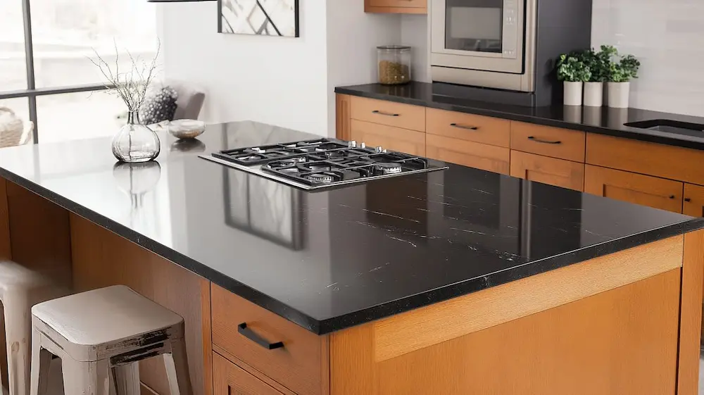 custom kitchen remodel featuring a dark granite countertop island with rich natural veining in clearwater
