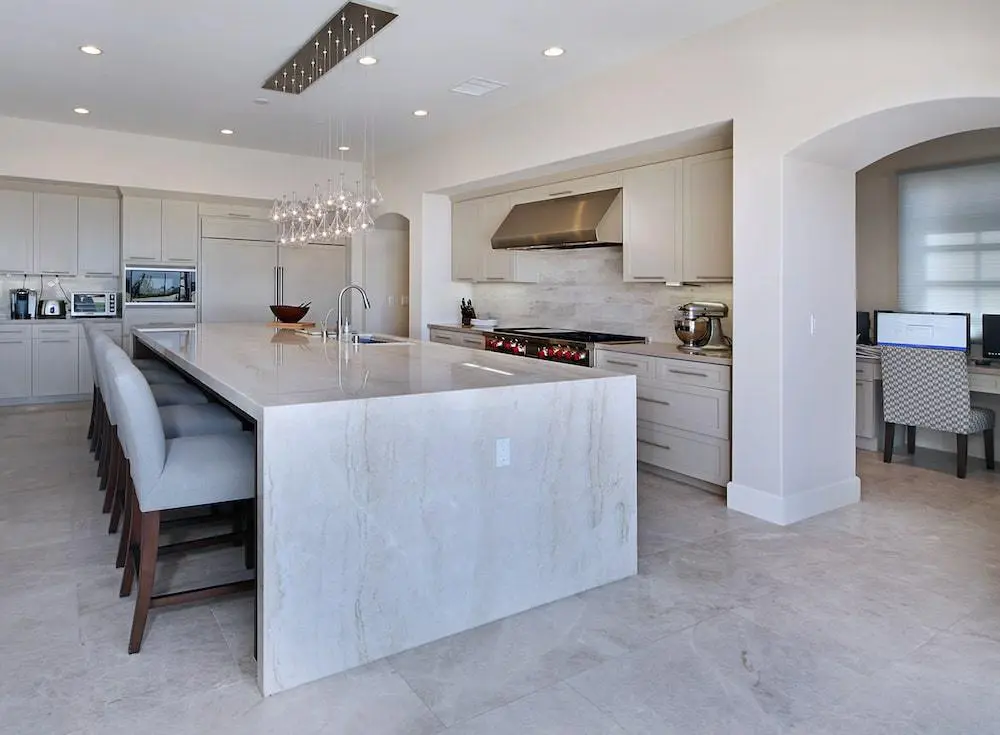 elegant kitchen in sarasota featuring quartzite countertops with sweeping marble like veining