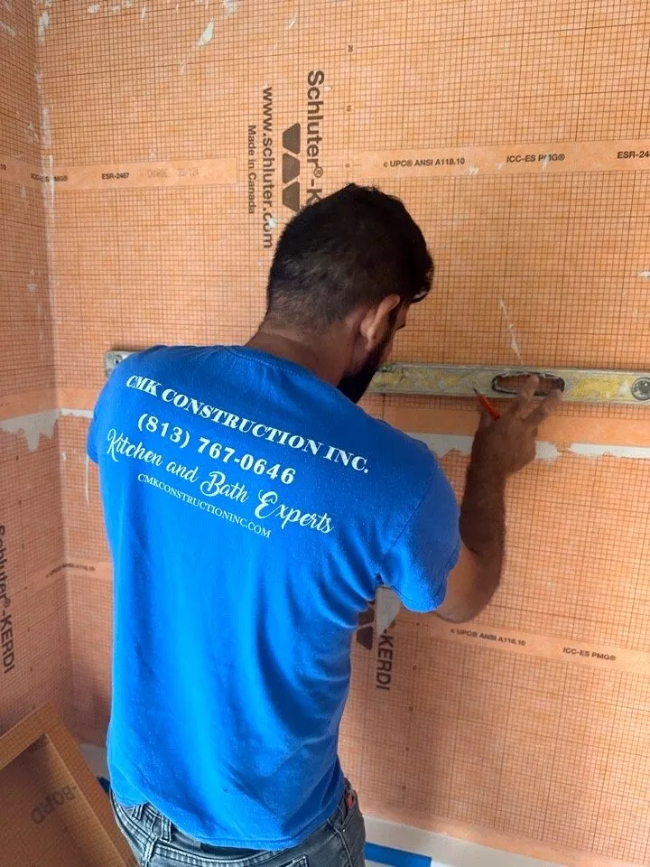 Schluter waterproofing membrane installed on the tub surround during a Safety Harbor bathroom remodel