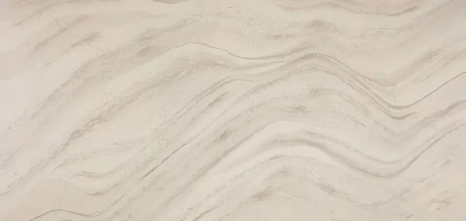 Cambria Everleigh Warm quartz slab with soft flowing cream wave movement