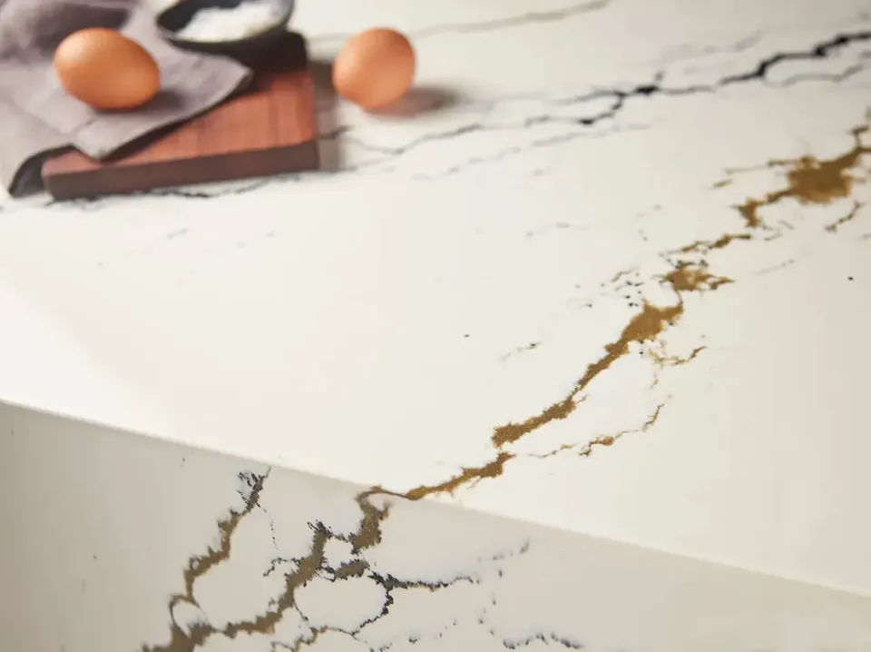 Cambria Oakleigh quartz countertop with bold gold and brown veining on cream