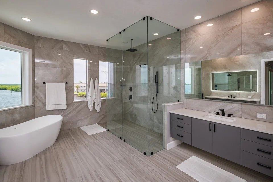 Curbless shower with black hardware on frameless glass in Palm Harbor FL