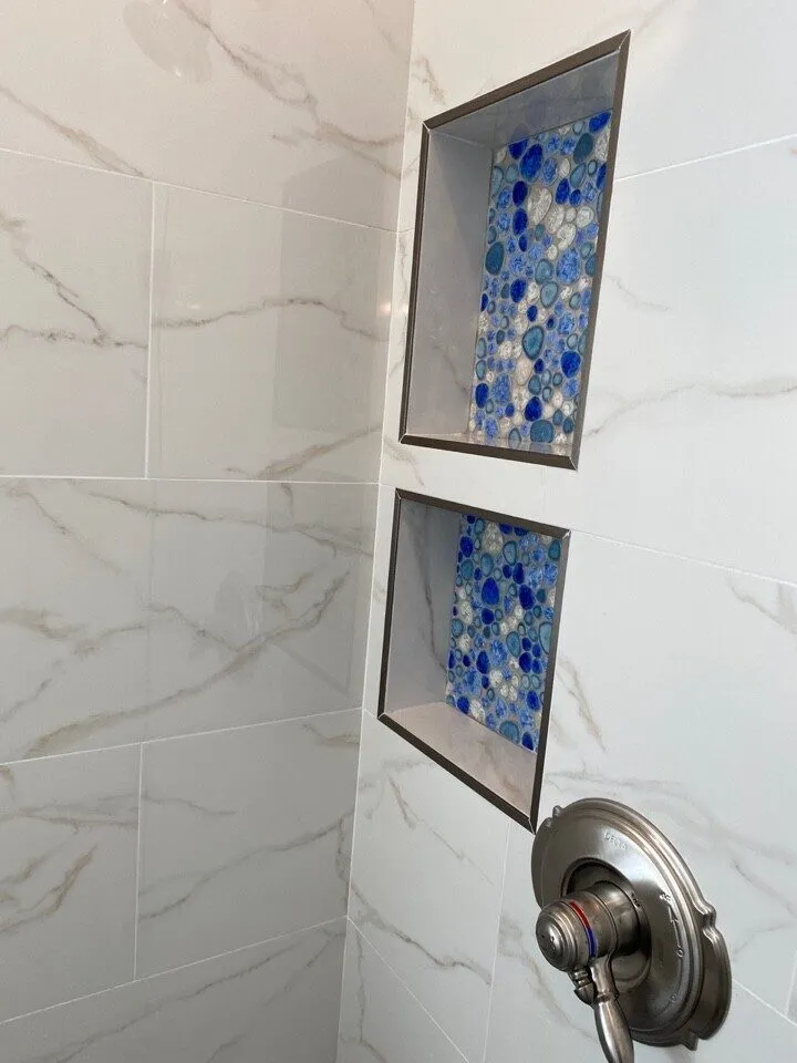 Double stacked shower niche in a Land O Lakes bathroom remodel by CMK