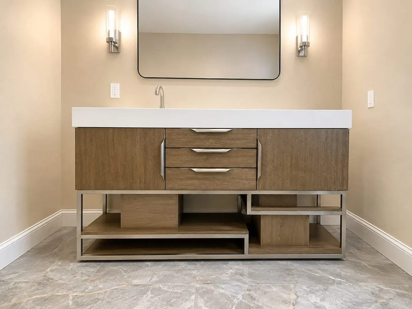 Modern console vanity with open metal frame base and integrated white countertop in a Lakewood Ranch bathroom remodel