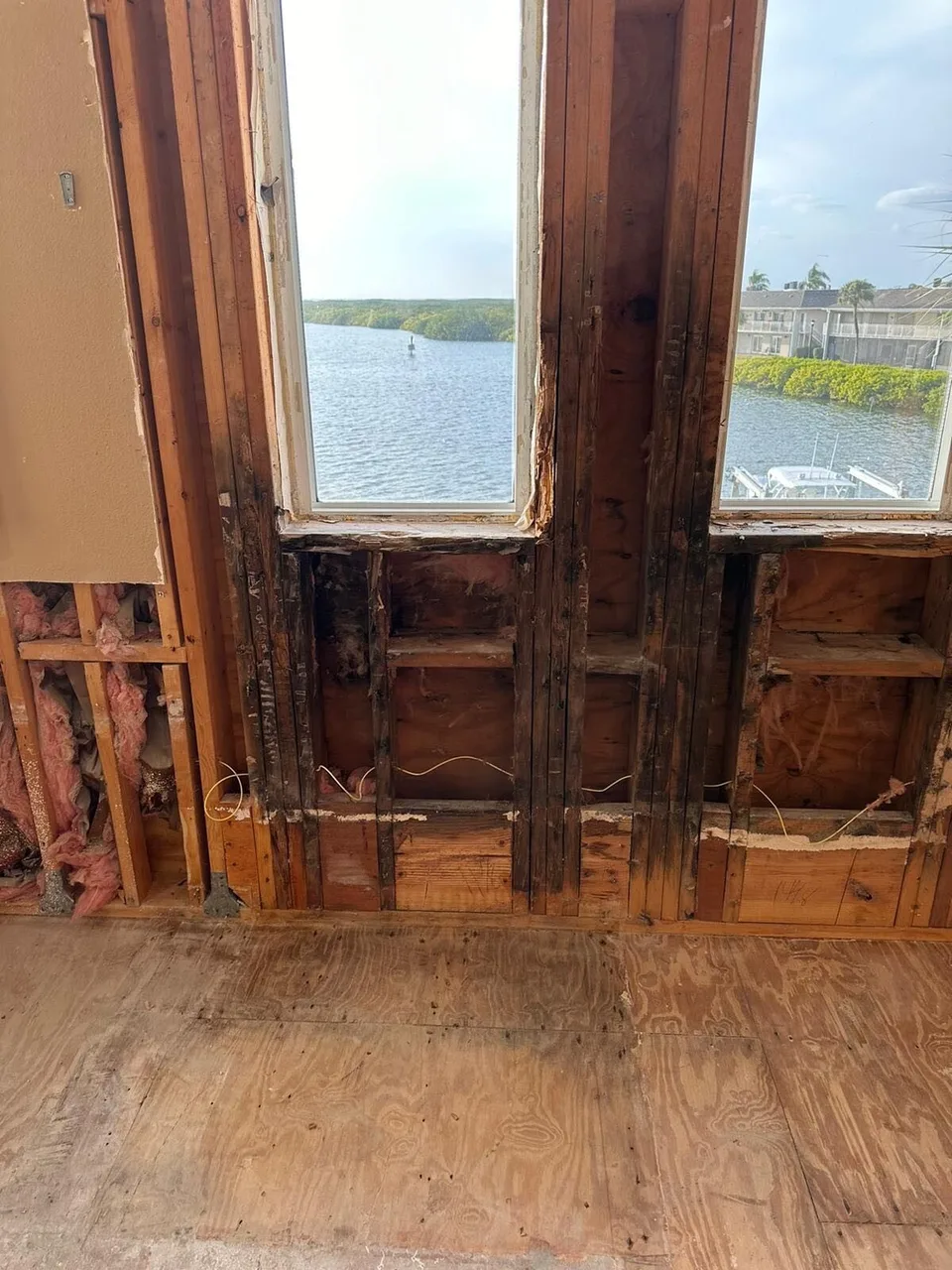 Rotted and water damaged wall framing uncovered during demolition of a Tampa waterfront bathroom remodel